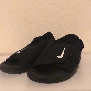Nike women’s sunday adjust sandals.